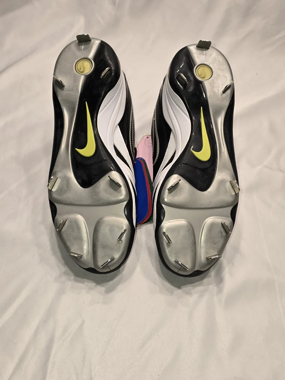 Nike Black and White Baseball Cleats with Colored Heel Tabs